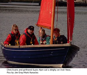 Chris Evans Radio one dj and tv presenter with girlfriend Suzie Alpin sailing a dingy