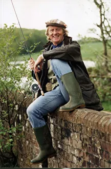 Wellington Boots Prints: Chris Tarrant Capital Radio Disc Jockey and TV Presenter fishing at Lakedown Fishery
