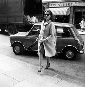 Christine Keeler returning to her Devonshire Street flat after visiting the police