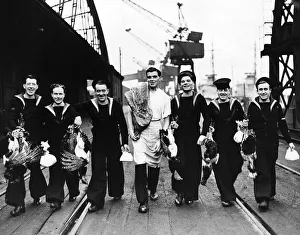 00052 Prints: Christmas December 1943 Sailors from minesweepers taking aboard Xmas fare