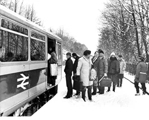 Christmas shoppers get on one of the new British Rail Pacer trains on 21st December 1985