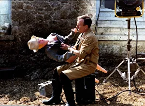 Doll Prints: Christopher Timothy actor together with a blow-up doll on the set of the TV programme All