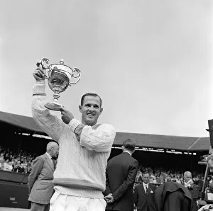 Mens Game Prints: Chuck McKinley wins the 1963 mens singles final at Wimbledon
