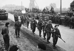 Churchill tanks of 6th Guards Tank Brigade with infantry of the Highland Light Infantry