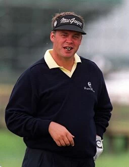 Images Dated 13th July 1999: The cigar-smoking Darren Clarke of England at the 128th Golf Open at Carnoustie, Scotland