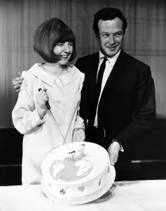 Cilla Black Singer / TV Presenter cutting cake with Brian Epstein in 1964
