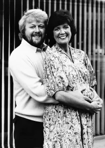 Cilla Black Singer / TV Presenter with husband Bobby Willis arms round waist MSI