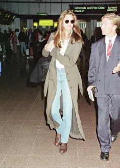 01479 Prints: Cindy Crawford, American Model, at London Heathrow Airport, returning to the US