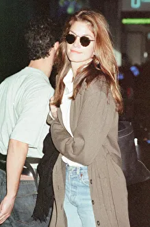 01479 Prints: Cindy Crawford, American Model, at London Heathrow Airport, returning to the US