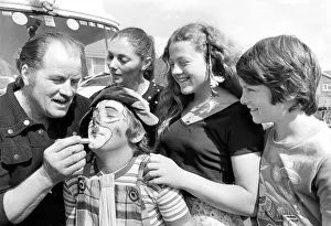 Circus Prints: Circus clown Karl Brenner gives his 11 year old son Jan-Erik some make-up tips before