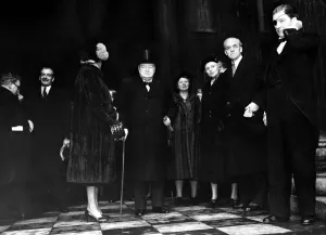 City crowds cheer Labour leader Clement Attlee and Conservative leader Winston Churchill