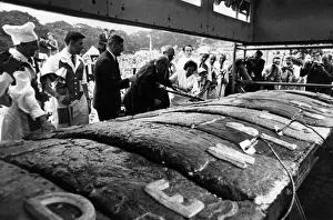 With Civic Dignity, Mr. Jonas Kenyon cuts the first slice of Denby Dales six-ton pie