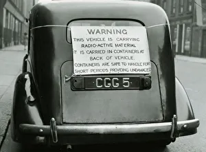Nuclear Prints: Civil Defence exercise June 1952 Car with sign on boot saying Warning This Vehicle