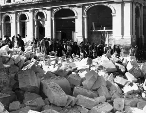Shelter Prints: Civilians collect at the entrance to an air raid shelter as the sirens sounds, Valetta