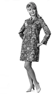 This classic shirt-dress has a superbly slim-line front band