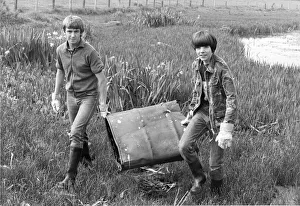 Cleaning the rivers of unwanted rubbish - Neil Kelly and Nick Rowell have a barrel of fun