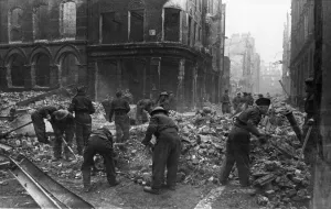 Clearing away rubble at a scene of destruction on Silver Street
