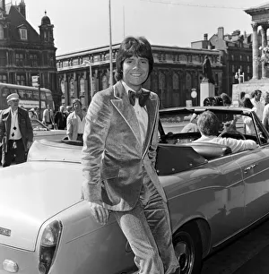 Cliff Richard leaving a Birmingham hotel for location work on his latest film