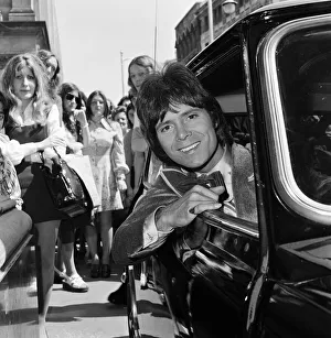 Cliff Richard leaving a Birmingham hotel for location work on his latest film