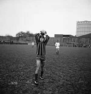 Cliff Richard playing football at a charity football match at Southall. 1st January 1973