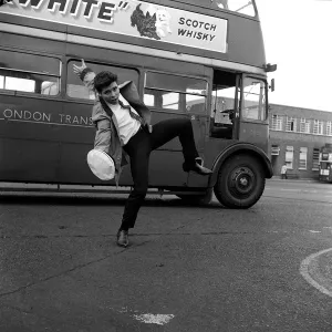 Cliff Richard prepares for his ne role in Summer Holiday by taking control of a 7
