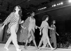 Clothes Show Prints: Clothes Show Live, models in spots and dresses slit to the waist stride out