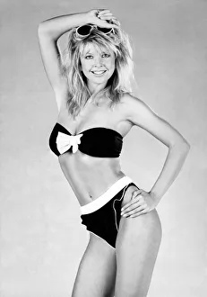 Clothing Beach. Sultry charm frilly knicker bikini with bow and a host of roll up