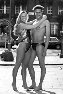 Clothing Beachwear. Austin Shortman and Zarah Long model the hologram swimwear