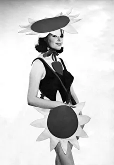 00025 Prints: Clothing Beachwear. Sun hat and matching bag in a sunflower design