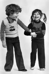00077 Prints: Clothing: Children: Latest casual fashions for children modelled by Steven and Tamara