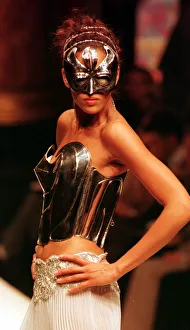 Masks Prints: Clothing by Emanuel Ungaro 1998 model wearing Emanuel Ungaro designed outfit