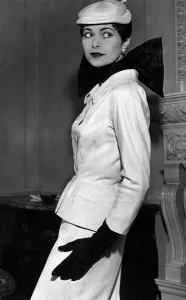 00433 Prints: Clothing-Fashion 1954: No. 3 Mehitable'a suit in white wool scooped out