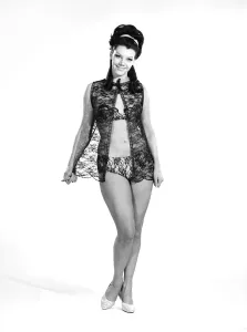 Clothing: Fashion: Beachwear: Woman wearing swimming costume. Model: Jo Anne Asher