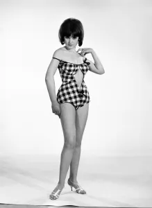 Clothing: Fashion: Beachwear. Woman wearing swimming costumes. Model: Debbie Attwood