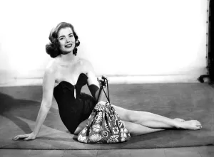Clothing: Fashion: Beachwear: Women modelling beach robe that can convert into a bag or a
