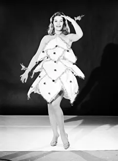 Clothing: Fashion: Dresses: Woman wearing Christmas tree dress. Model: Yvonne Buckingham