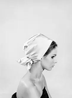 Clothing: Fashion: Hats: Model: Sally Noel. 1964 B1533