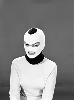 Clothing: Fashion: Hats: Woman wearing balaclava hat. Model: Della-Pat Young. 1965