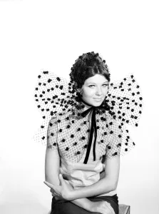 Clothing: Fashion: Hats: Woman wearing hats with veils. 1962 B1544-017