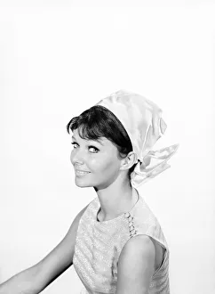 Clothing: Fashion: Hats: Woman wearing hats with veils. 1962 B1544-008