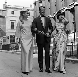 Tuxedo Prints: Clothing Fashion June 1965 Jean Rollins wearing turquoise printed silk sarong with