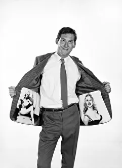 Clothing: Fashion: Menswear: Man wearing pin-up Jacket. Model: Michael Lester