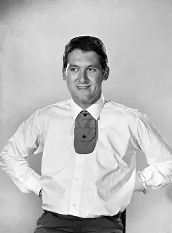 Clothing: Fashion: Menswear: Man wearing shirt and tie. Model: Mike Lester