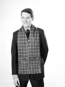 Clothing: Fashion: Menswear: Man wearing tartan muffler. Model: Michael Lester