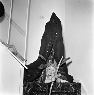 Clothing fashion. Model Ann Coates wearing a maxi coat. December 1969 Z11860-004
