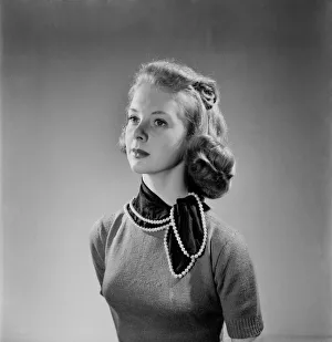 Clothing: Fashion : Pearl - edged hankie which can double as a neck scarf. June 1952 C3239