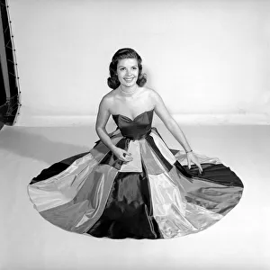 Clothing: Fashion: Skirts: Woman wearing flying panel dress. Model: Pat Owens