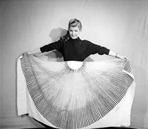 Skirt Prints: Clothing: Fashion: Skirts: Woman wearing pleated skirt. 1953 B127