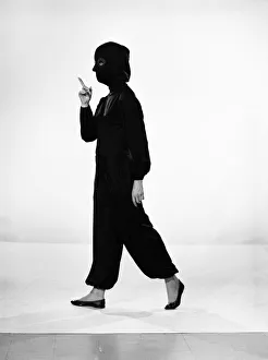 Clothing: Fashion: Suits: Woman wearing space suit. Model: Valerie Gaten