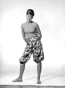 Clothing: Fashion: Trousers: Model wearing floral pattern pants. 1966